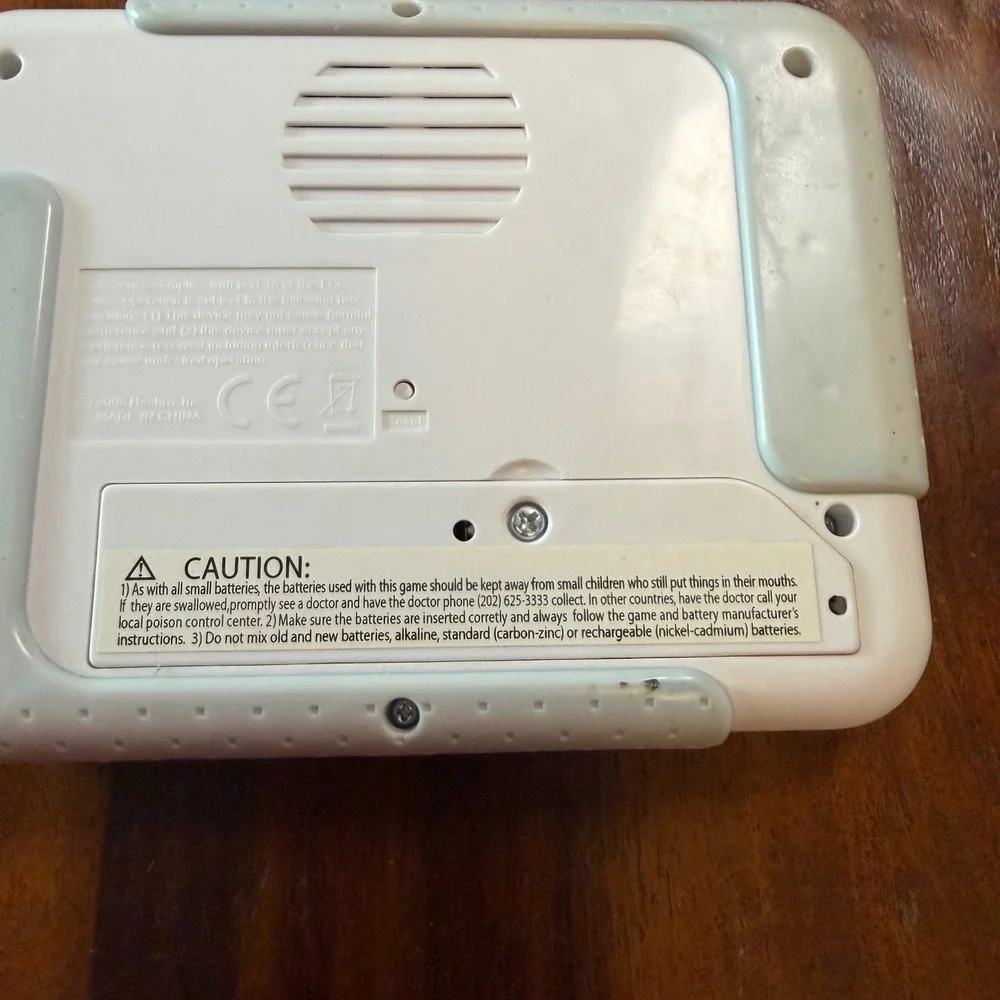 Hasbro Catch Phrase Music Edition Handheld Electronic Game 2005 White Green